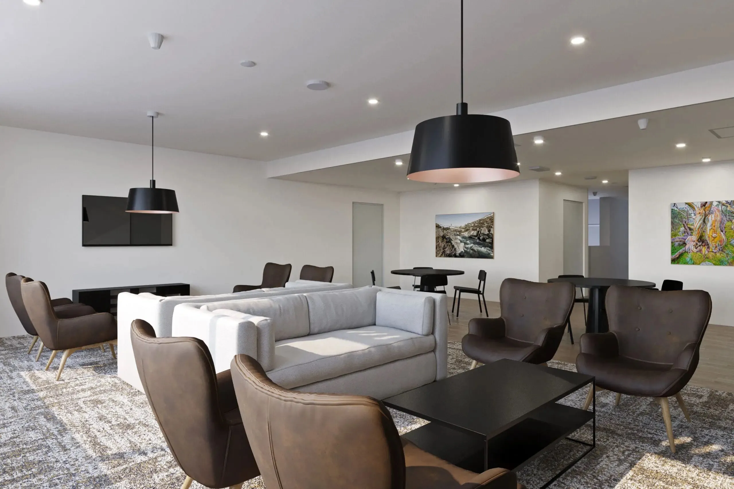 Hotel lounge seating under black dome pendants